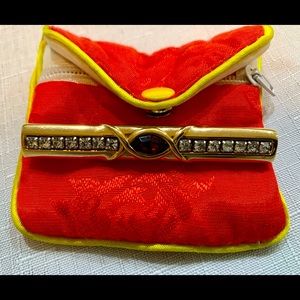 Antique pin with amethyst center